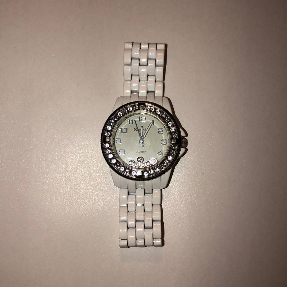 Woman’s white watch